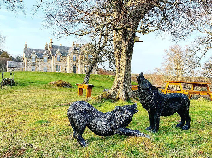Statue of wolves at Alladale Wilderness Reserve